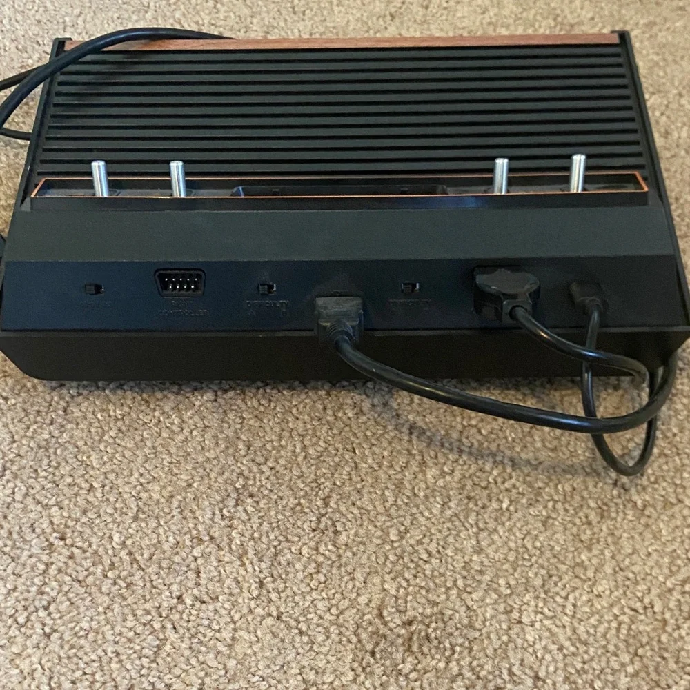 Atari Black and Brown Video Game Console